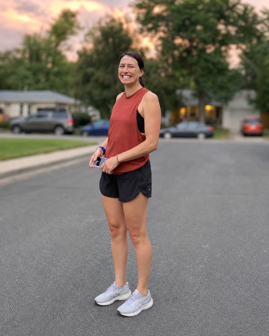 Nicole smiling outdoors in Englewood.